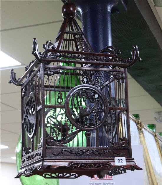 A Chinese hardwood birdcage, width 29cm height 64cm